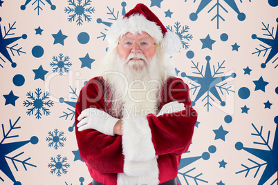 Composite image of santa smiles with folded arms