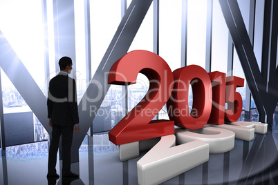 Composite image of businessman standing