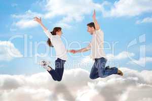 Composite image of couple jumping and holding hands