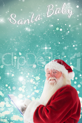 Composite image of santa uses a tablet pc and smiles into the ca