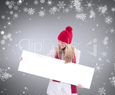 Composite image of pretty blonde showing white banner