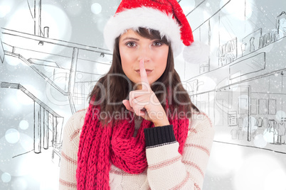 Composite image of festive brunette keeping a secret