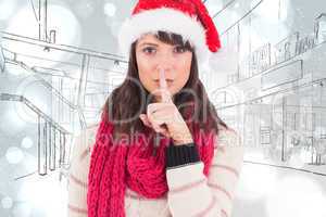 Composite image of festive brunette keeping a secret