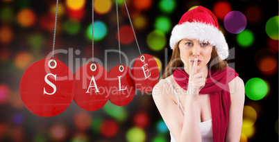 Composite image of festive redhead smiling at camera Composite image of festive redhead smiling at camera