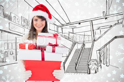 Composite image of attractive woman wearing santa hat with gifts