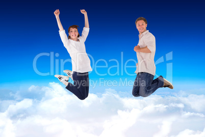 Composite image of couple jumping in the air