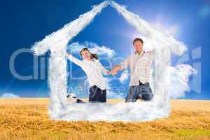 Composite image of couple jumping and holding hands