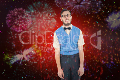 Composite image of geeky hipster pulling a silly face