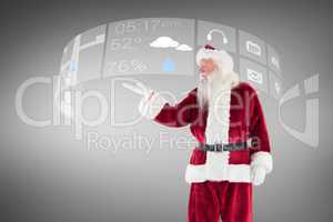 Composite image of santa shows something to camera