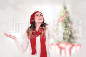 Composite image of surprised brunette with hands out