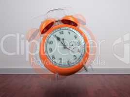 Composite image of alarm clock counting down to twelve