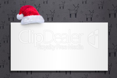 Composite image of santa hat on poster