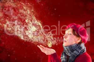 Composite image of woman blowing kiss from hands