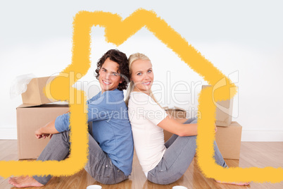 Composite image of couple sitting on the floor