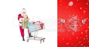 Composite image of santa delivering gifts with a trolley