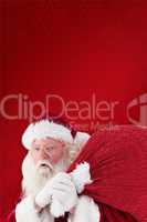 Composite image of santa takes care about his sack