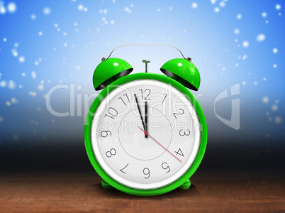 Composite image of alarm clock counting down to twelve