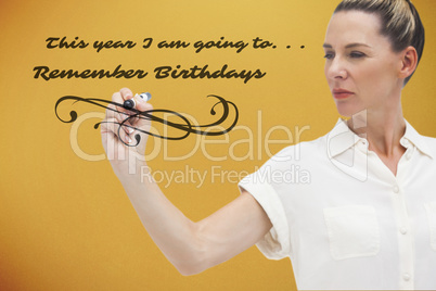 Composite image of serious businesswoman looking at pen in her h