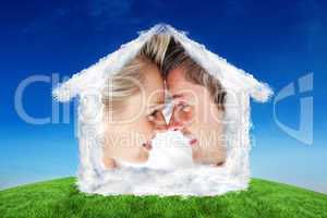Composite image of close up of smiling couple looking at each ot