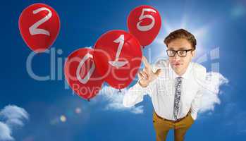 Composite image of young geeky businessman pointing to camera