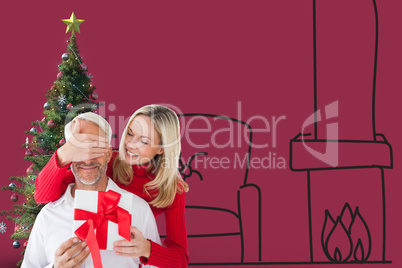 Composite image of loving couple with gift