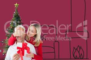 Composite image of loving couple with gift