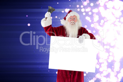 Composite image of santa holds a sign and rings his bell