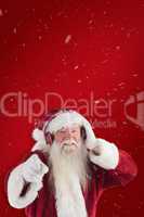 Composite image of santa is listening some music