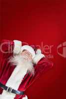 Composite image of sleeping santa