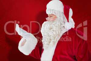 Composite image of father christmas with hand out