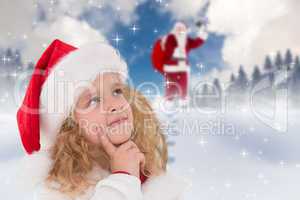 Composite image of festive little girl thinking and looking up