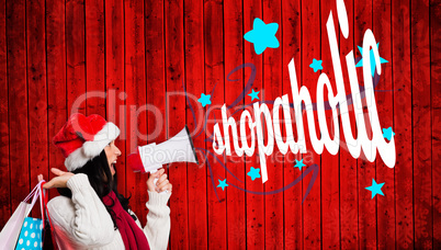 Composite image of woman holding some shopping bags