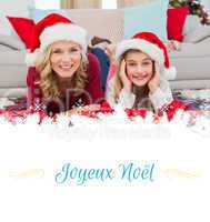 Composite image of festive little girl with mother surrounded by