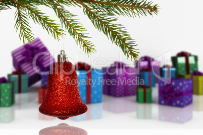 Composite image of red christmas decoration hanging from branch