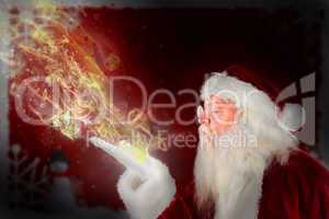 Composite image of santa claus blowing