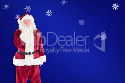 Composite image of santa asking for quiet to camera