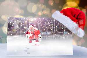 Composite image of santa hat on poster