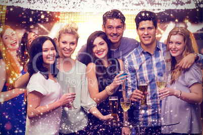 Composite image of friends with drinks