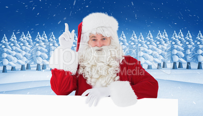 Composite image of smiling santa claus doing a gesture