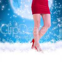 Composite image of lower half of girl in red skirt and heels