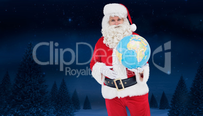 Composite image of happy santa claus holding a globe