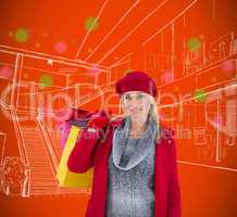 Composite image of blonde in winter clothes holding shopping bag