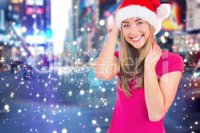 Festive blonde smiling at camera