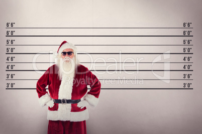 Composite image of santa claus wears black sunglasses