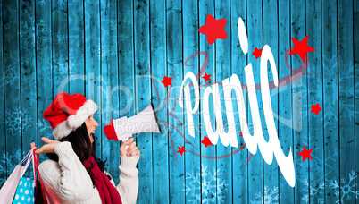 Composite image of woman holding some shopping bags