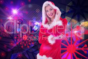 Composite image of festive blonde smiling at camera