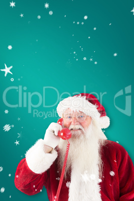 Composite image of santa claus on the phone