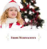 Composite image of festive little girl in santa hat and scarf