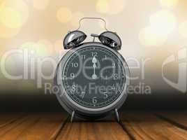 Composite image of alarm clock counting down to twelve