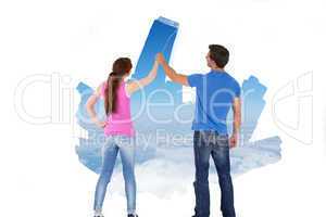 Composite image of couple painting together